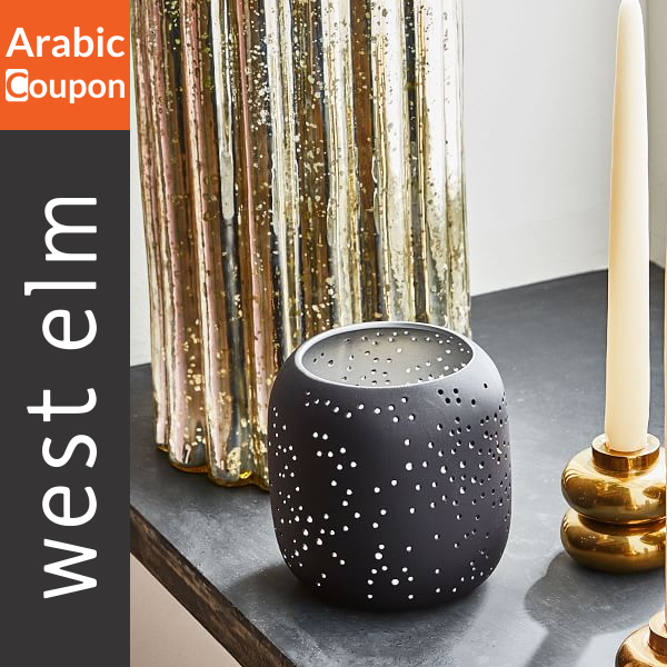 West Elm candle holder with an engraved design